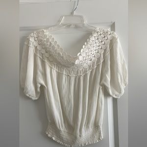 Cute off shoulder top. Size medium